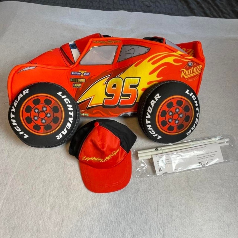 Toddler costume Lightning McQueen car with hat. NWOT Straps fits most.